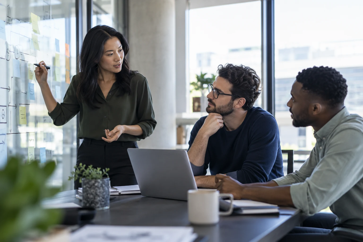 Illustration of a technology team collaborating in a modern office